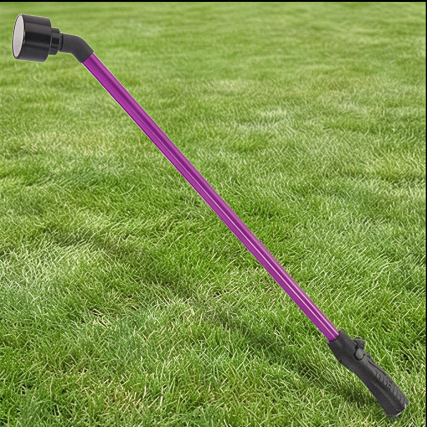 Berry purple 16-inch Dramm One Touch Rainwand with black nozzle and handle on green grass.